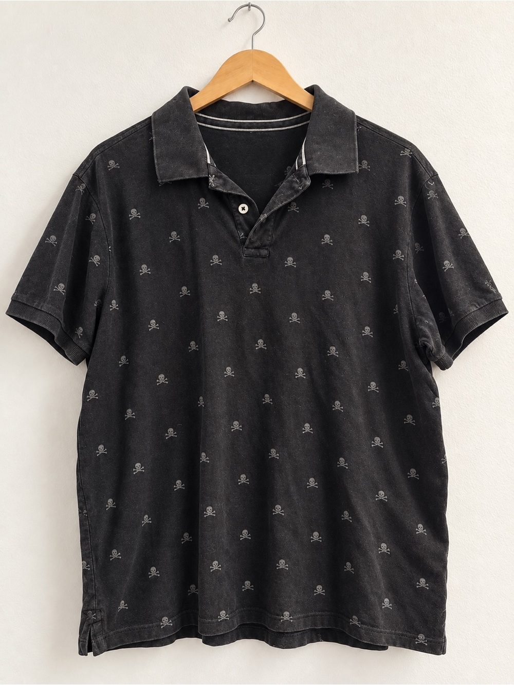 A68. Old Navy Men's Black Polo Shirt with Subtle Skull Pattern